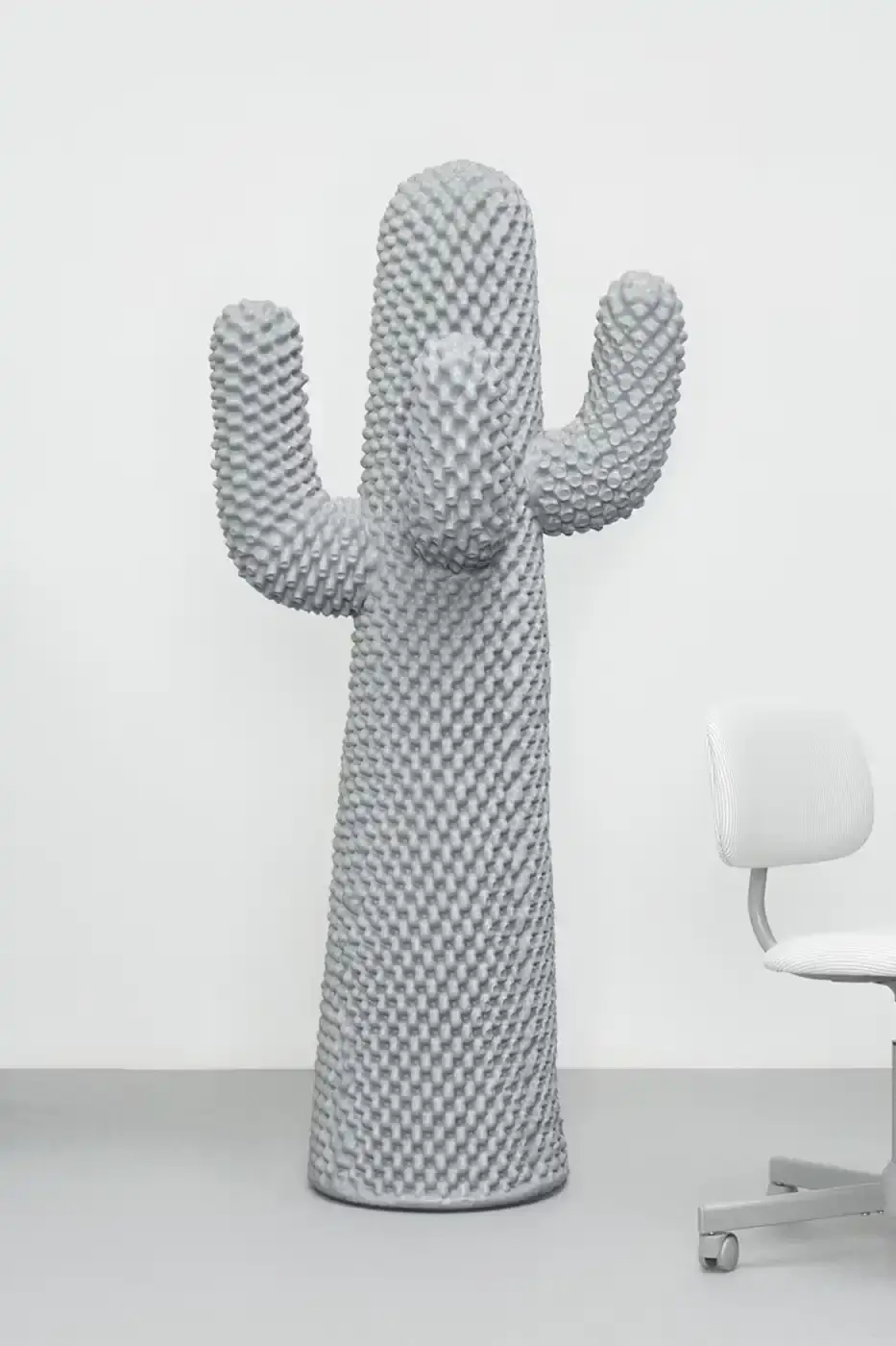 Gufram The BORING CACTUS® by Gufram, a life-size gray coat stand in the shape of a stylized cactus with four extending arms. The surface is covered in thousands of small nodules, and the piece stands 170 centimeters tall against a neutral background. (image 2 of 5)