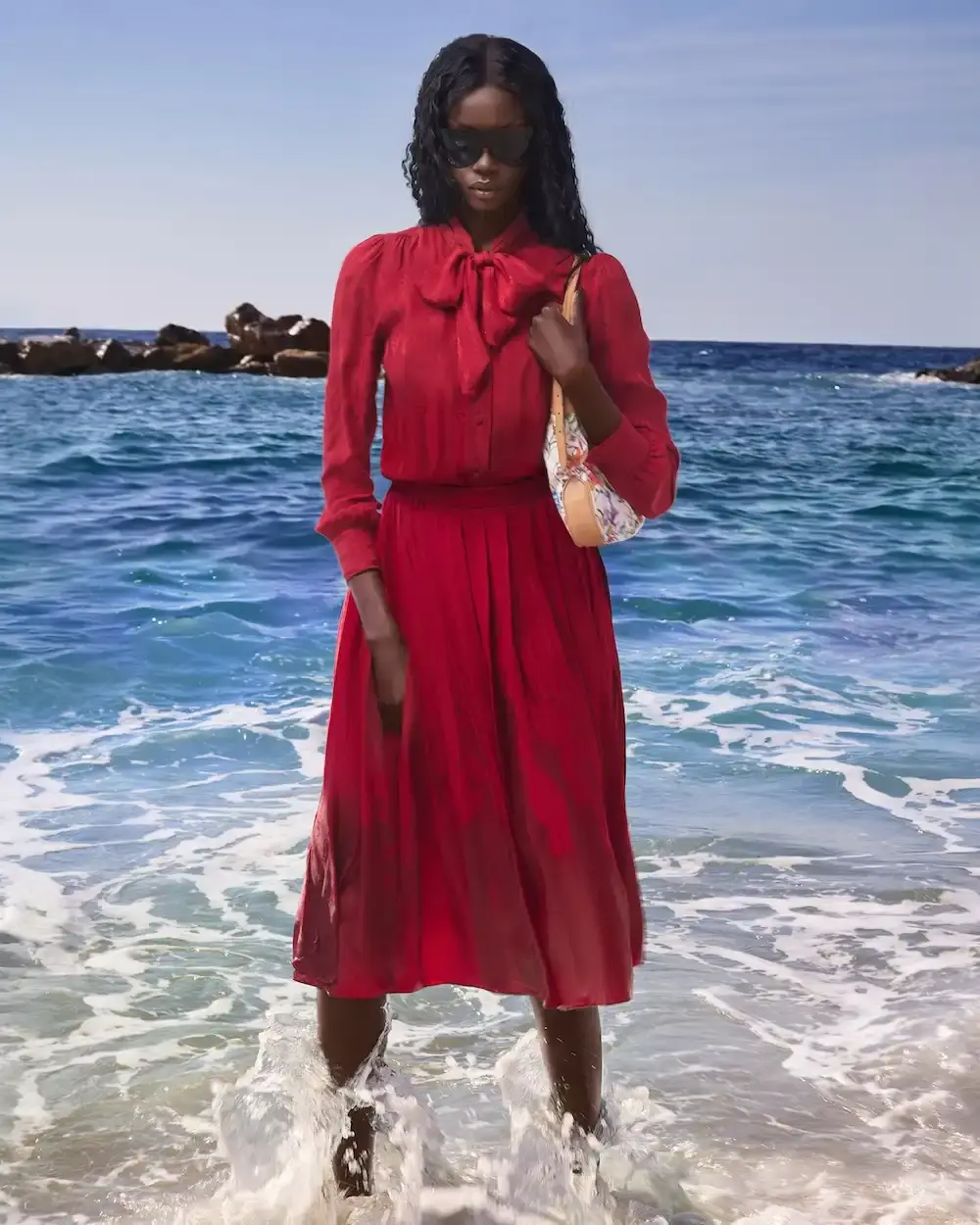 GUCCI SUMMER CAMPAIGN BRINGS FRESH STYLES TO MONTE CARLO Image detailing the new Gucci summer campaign set in Monte Carlo featuring models wearing new collection pieces and accessories. (image 5 of 8)
