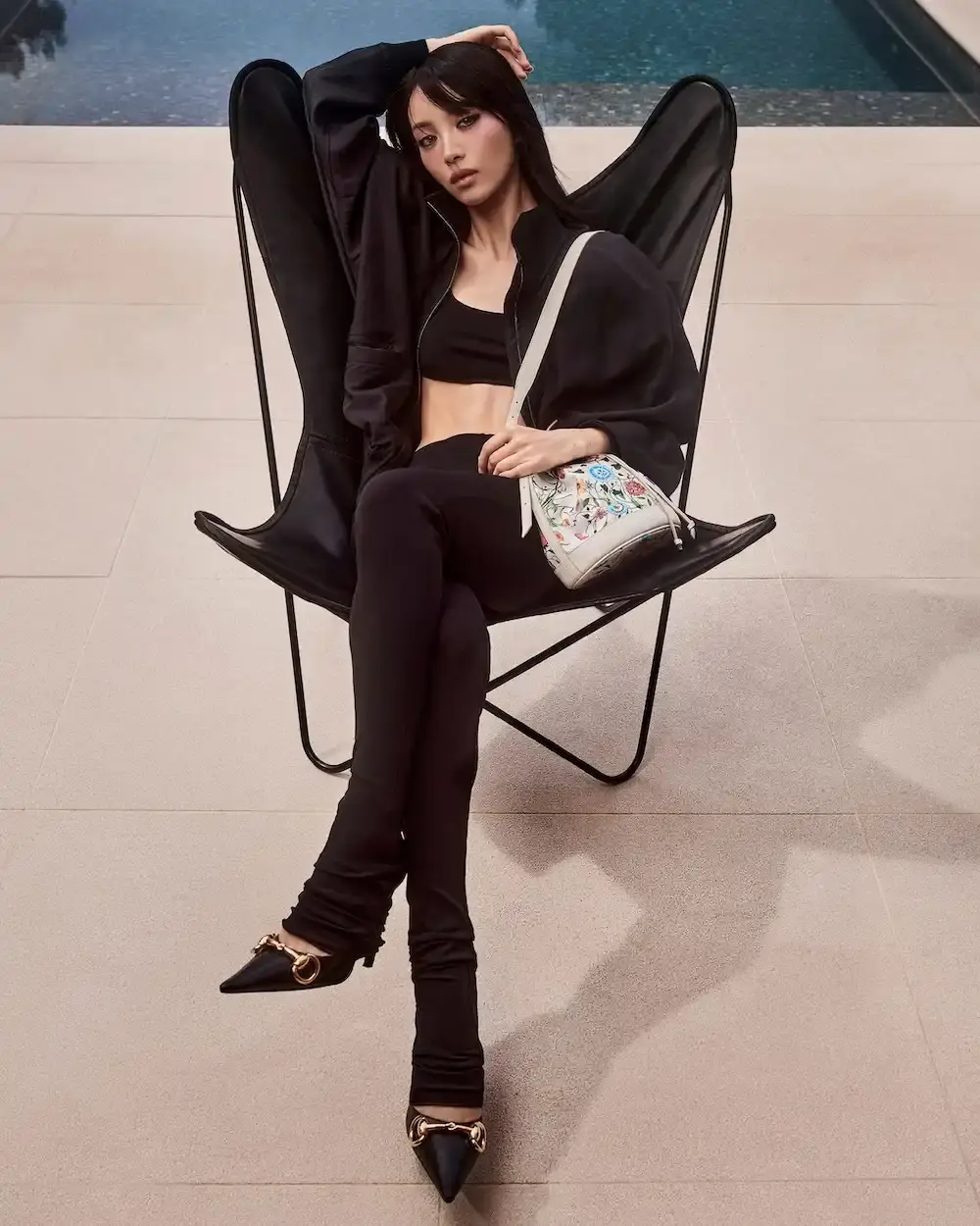 GUCCI SUMMER CAMPAIGN BRINGS FRESH STYLES TO MONTE CARLO Image detailing the new Gucci summer campaign set in Monte Carlo featuring models wearing new collection pieces and accessories. (image 2 of 8)