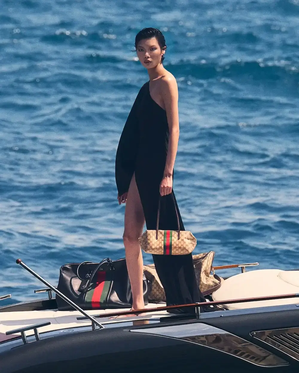 GUCCI SUMMER CAMPAIGN BRINGS FRESH STYLES TO MONTE CARLO Image detailing the new Gucci summer campaign set in Monte Carlo featuring models wearing new collection pieces and accessories. (image 6 of 8)