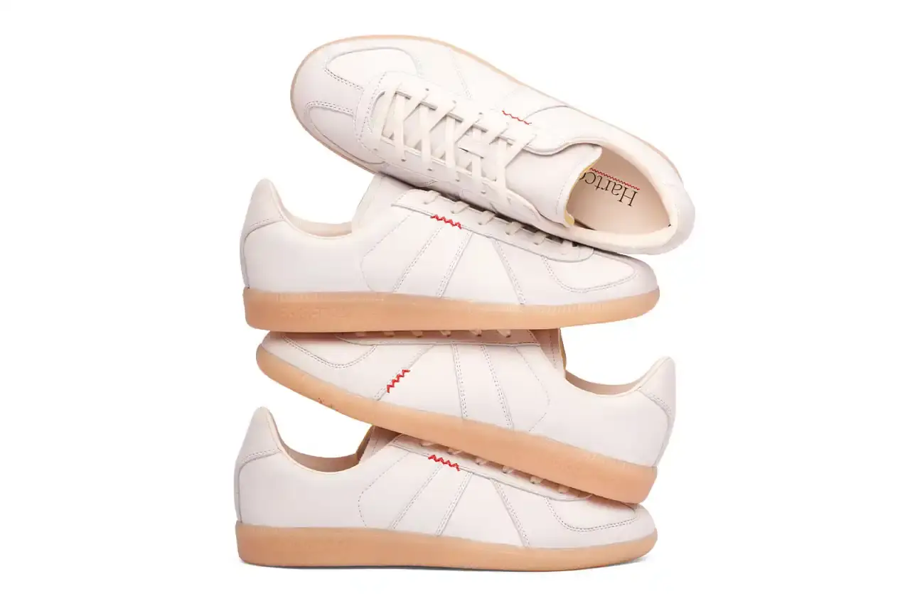 Lleumass/Timsuen/Hartcopy White leather adidas BW Army sneaker with gray nubuck panels, red embroidered line details on the sides, and gum rubber sole. Hartcopy's logo appears on the sockliner. The shoe maintains classic German Army Trainer silhouette with minimal branding. (image 5 of 10)