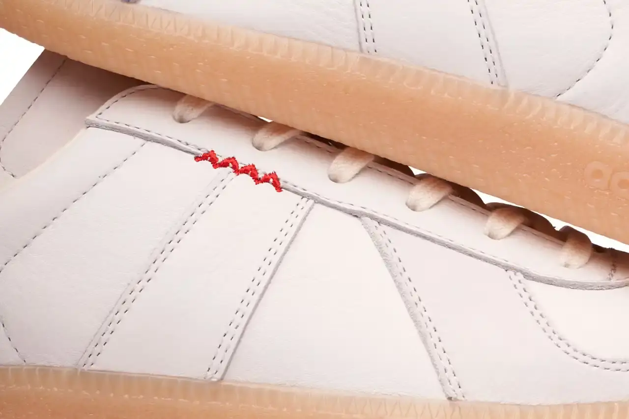Lleumass/Timsuen/Hartcopy White leather adidas BW Army sneaker with gray nubuck panels, red embroidered line details on the sides, and gum rubber sole. Hartcopy's logo appears on the sockliner. The shoe maintains classic German Army Trainer silhouette with minimal branding. (image 2 of 10)