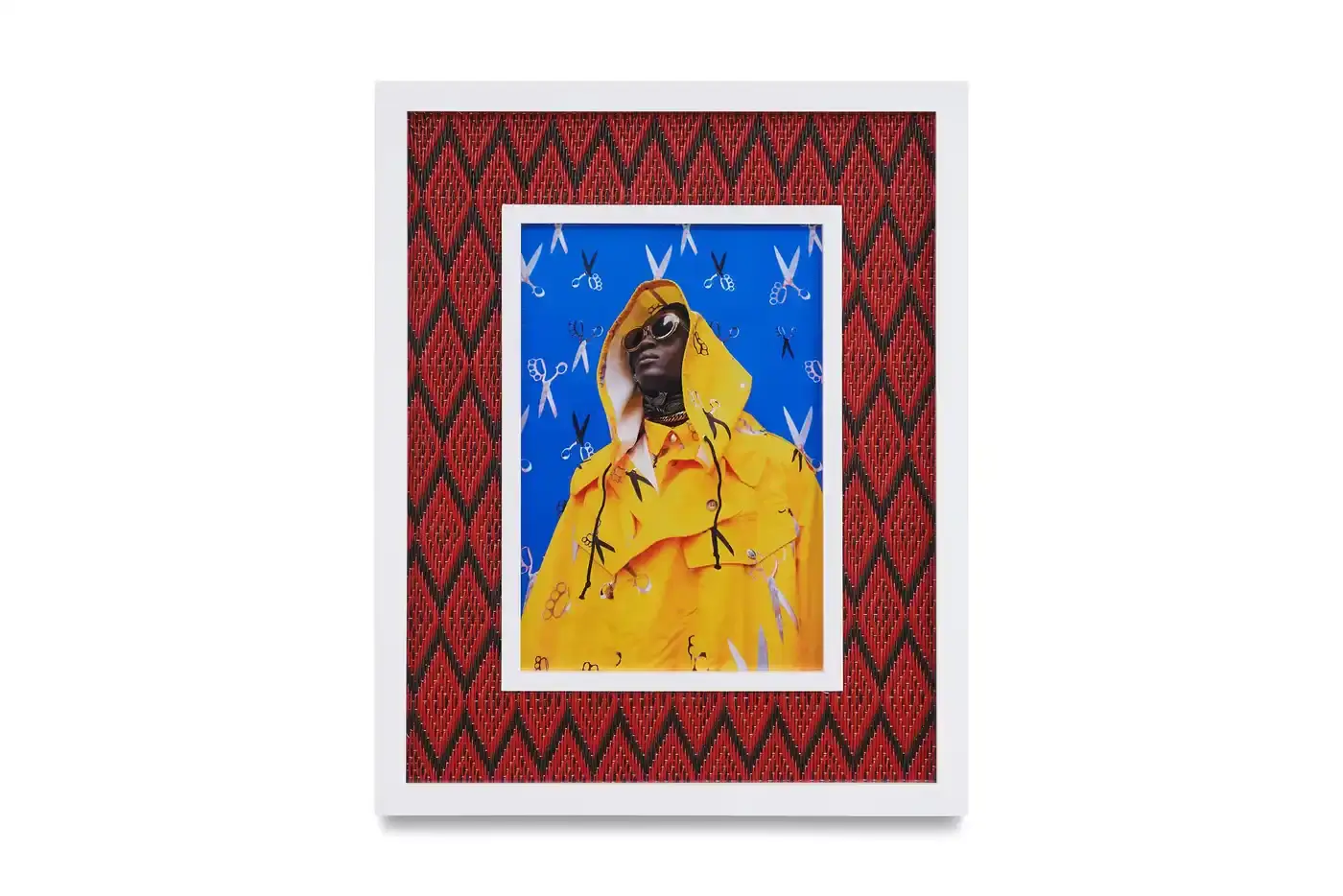 Courtesy Of The Artist And Hannah Traore Gallery Portrait gallery wall showing Hassan Hajjaj's photographs in colorful recycled Moroccan floor mat frames. Models wear mixed pattern clothing against vibrant backgrounds. (image 4 of 7)