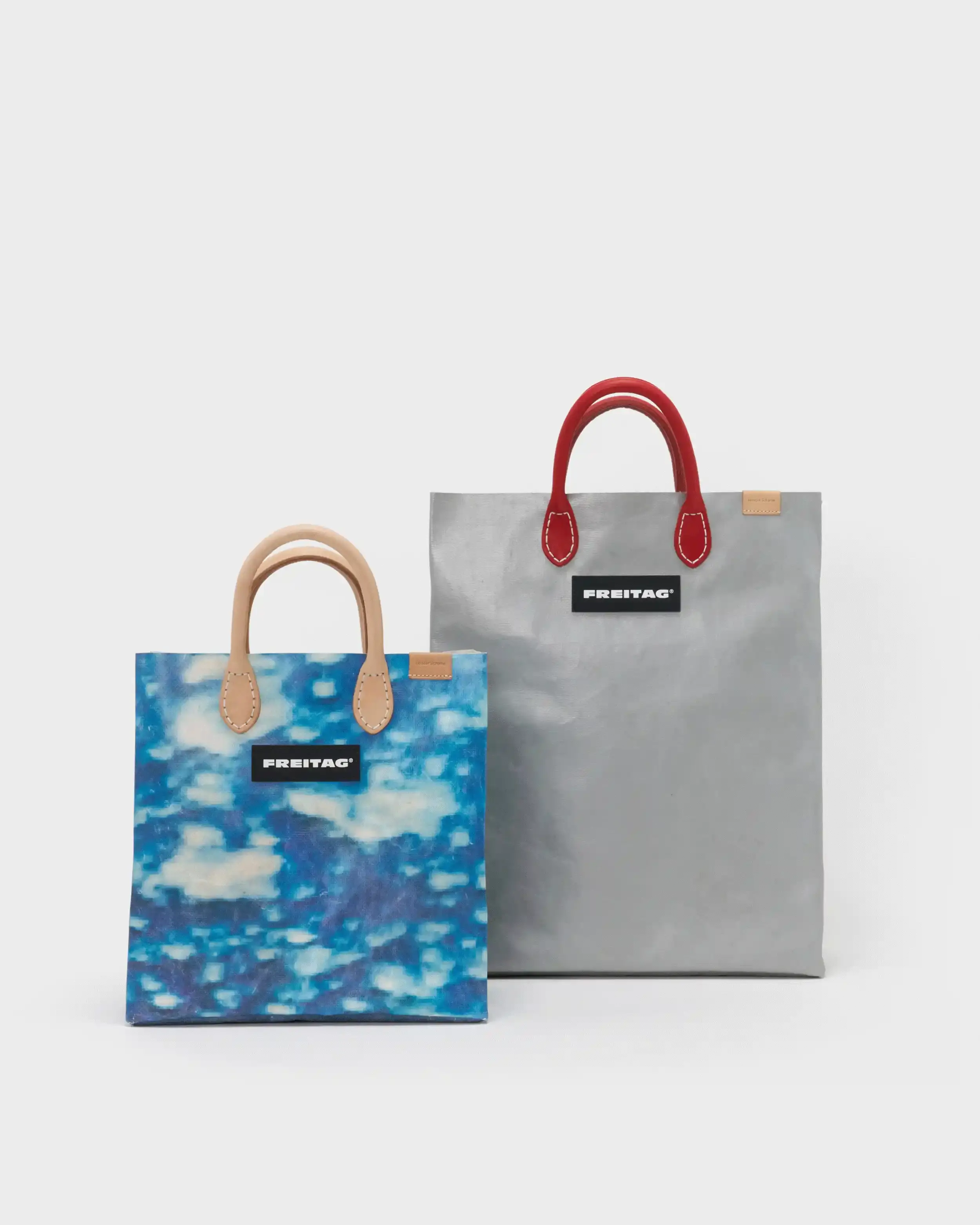HENDER SCHEME AND FREITAG UNITE FOR UPCYCLED BAGS image of Tokyo-based Hender Scheme collaborates with Zurich bag maker FREITAG to create limited edition shoppers featuring leather handles made from production waste, replacing original truck tarp straps. (image 3 of 7)