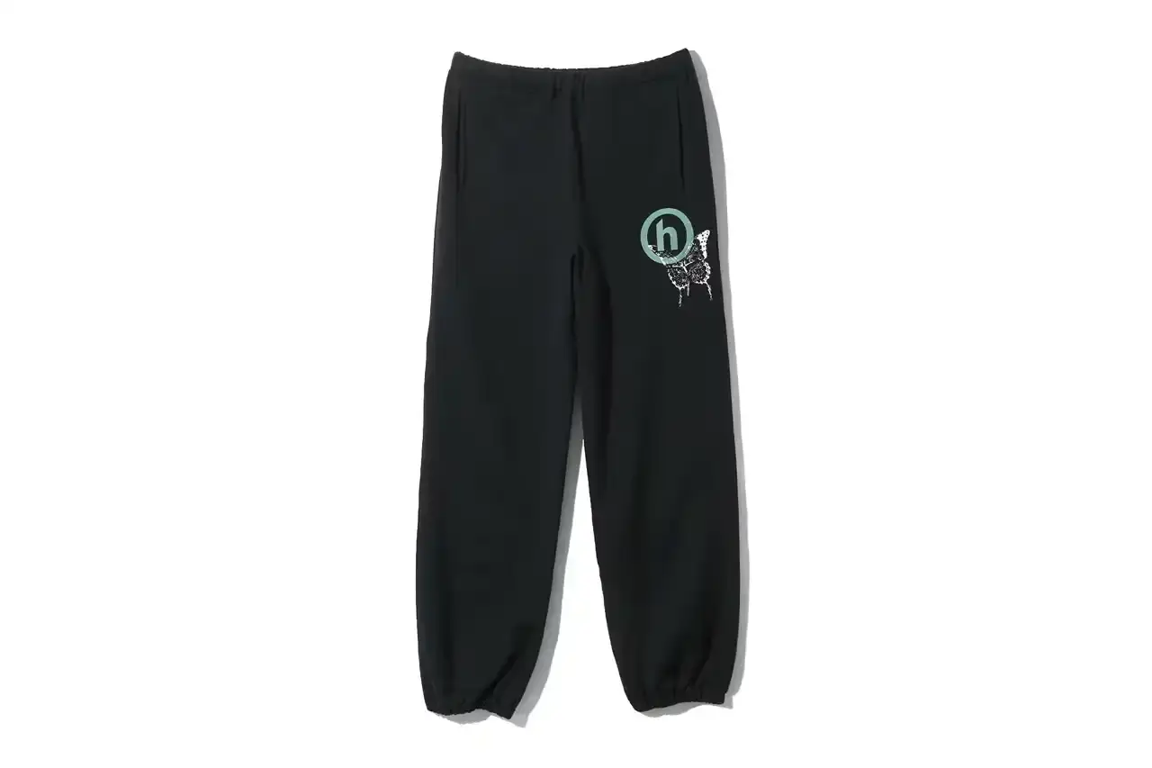 HIDDEN.NY AND NEEDLES UNVEIL LATEST COLLAB CAPSULE HIDDEN.NY and NEEDLES streetwear collaboration capsule collection featuring green hues, overlapping logos, and digital-inspired graphics on classic NEEDLES styles like Cut t-shirts, tracksuits, and mohair cardigans. Exclusive launch at NEPENTHES Tokyo on September 27, including unique REBUILD BY NEEDLES pieces (image 14 of 15)