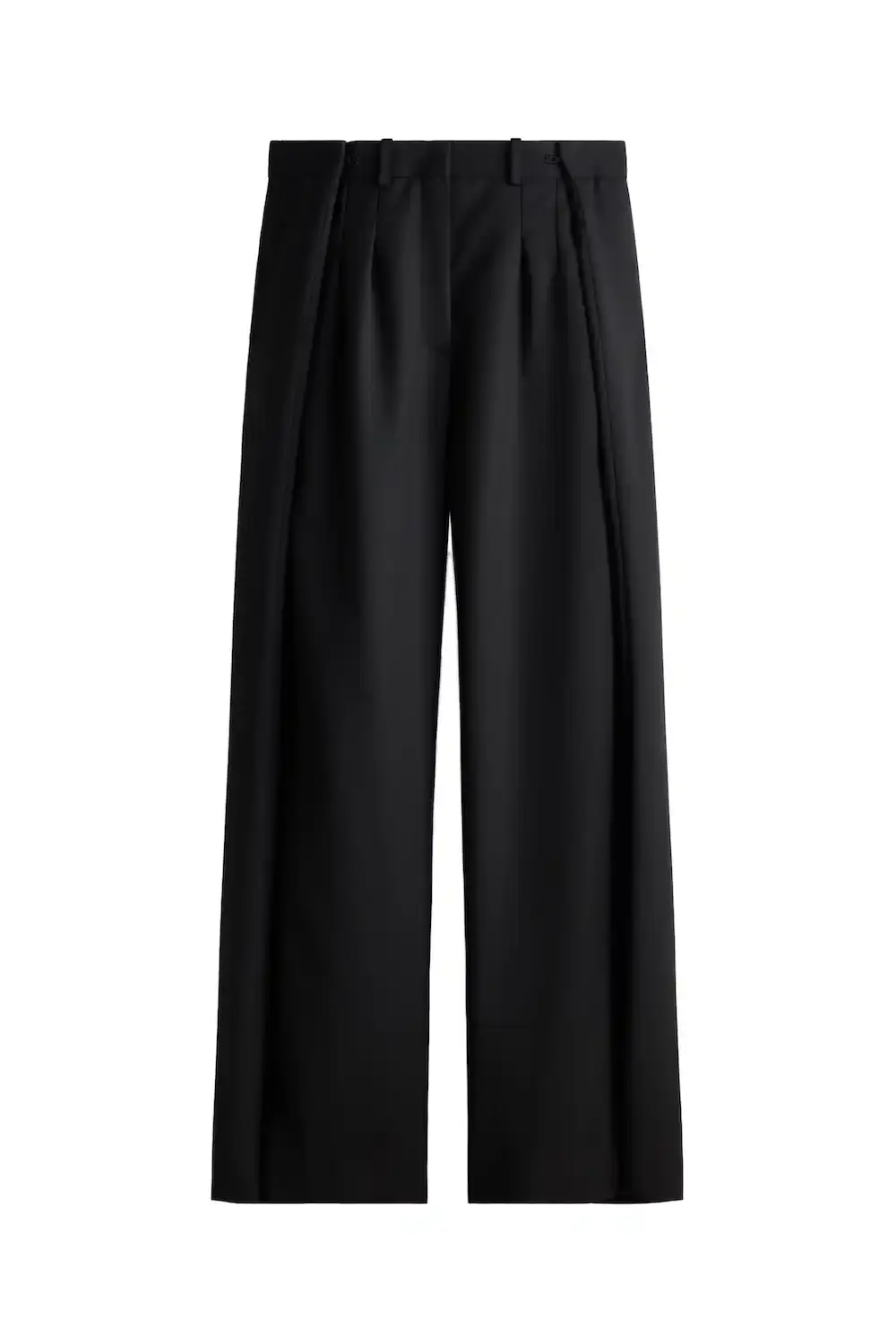 H&M STUDIO GOES ECCENTRIC FOR SPRING 2026 H&M Studio presents a spring/summer 2026 collection focused on individuality through asymmetric designs, contrasting colors, and adaptable pieces that challenge traditional fashion codes. (image 16 of 42)