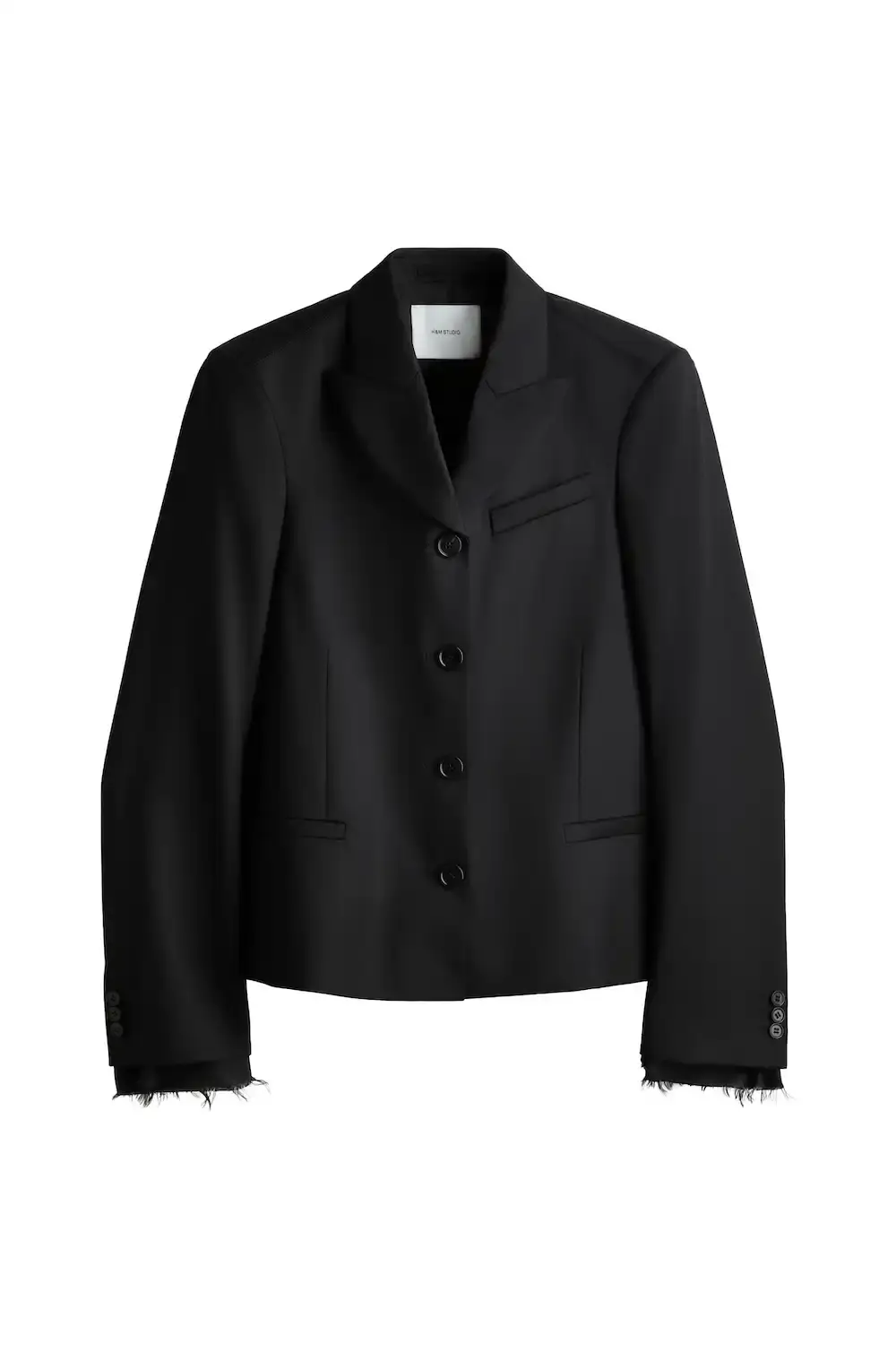H&M STUDIO GOES ECCENTRIC FOR SPRING 2026 H&M Studio presents a spring/summer 2026 collection focused on individuality through asymmetric designs, contrasting colors, and adaptable pieces that challenge traditional fashion codes. (image 37 of 42)