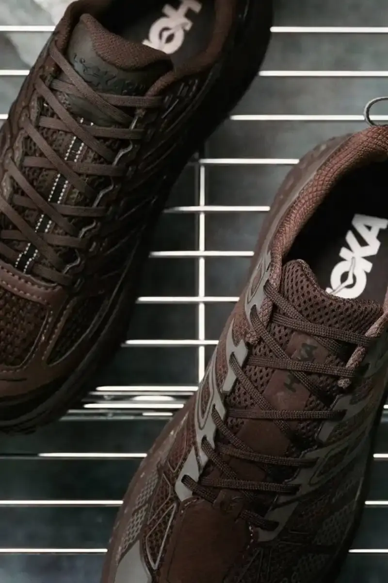 HOKA DROPS JAPAN-ONLY TRAIL RUNNERS IN BROWN HOKA releases two trail running shoes in a brown and grey color scheme, available only in Japan. The Speedgoat 2 and Mafate Speed 2 feature technical specs for runners and work as casual wear. (image 9 of 9)