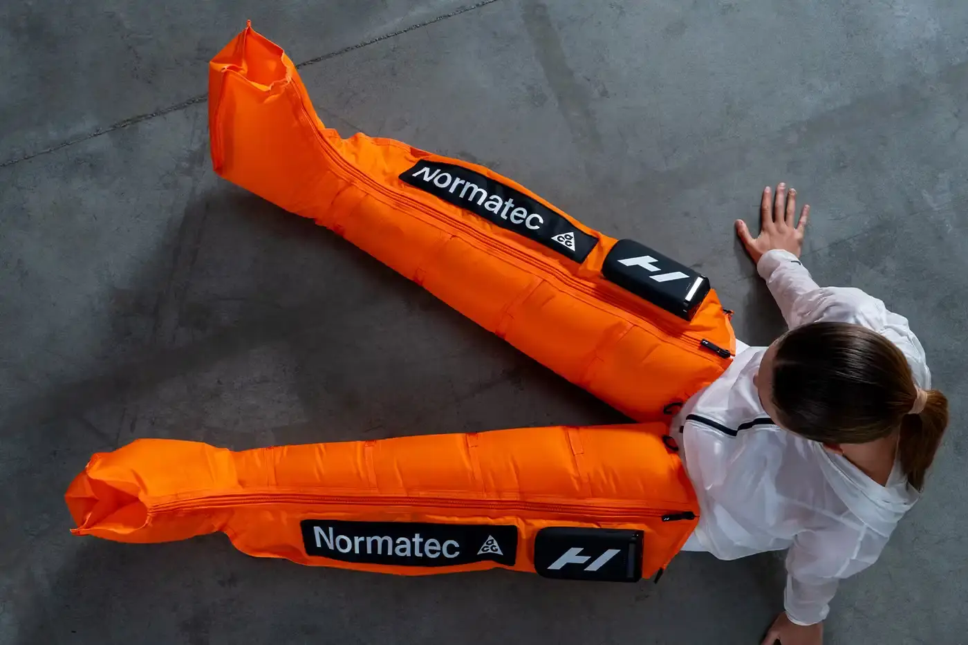 HYPERICE & ACG BUILD CUSTOM RECOVERY SYSTEM FOR 2026 OLYMPICS Hyperice and Nike ACG developed exclusive orange Normatec Elite compression therapy systems for Olympic athletes competing in Milan 2026, focusing on recovery during travel and competition.