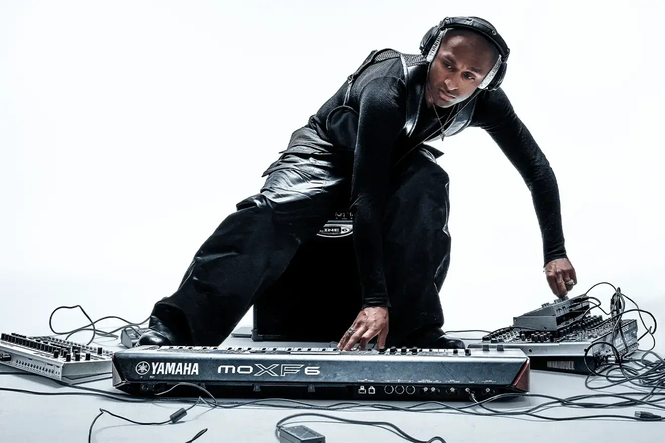 Kofi McCalla, known professionally as ICYKOF, transitions from fashion content creation to electronic music production with his debut EP, “Zero Sugar.” The English-Jamaican artist’s lead single, “She Knows,” features pulsating beats and digitalized vocals, with a remix by MoMA Ready. Inspired by Detroit techno and Robert Hood, the track narrates a love triangle. The visually striking video, set in Tokyo, complements the music. “Zero Sugar” reflects ICYKOF’s evolving artistic identity, influenced by London’s techno scene. The EP’s release marks a new chapter for McCalla, blending fashion and techno music