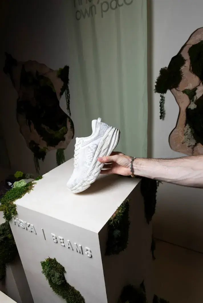 INSIDE THE HOKA × BEAMS COLLABORATION image about the interview discussing footwear design. The discussion covers shoe aesthetics, Japanese street fashion influences, and consumer movement for Hoka and Beams (image 1 of 7)