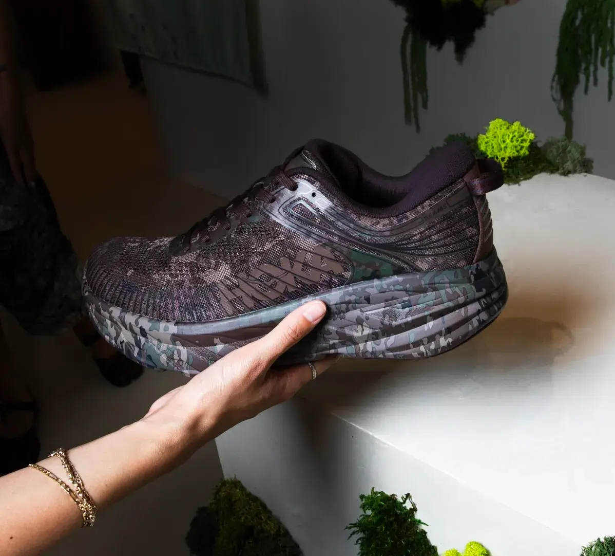 INSIDE THE HOKA × BEAMS COLLABORATION image about the interview discussing footwear design. The discussion covers shoe aesthetics, Japanese street fashion influences, and consumer movement for Hoka and Beams (image 6 of 7)