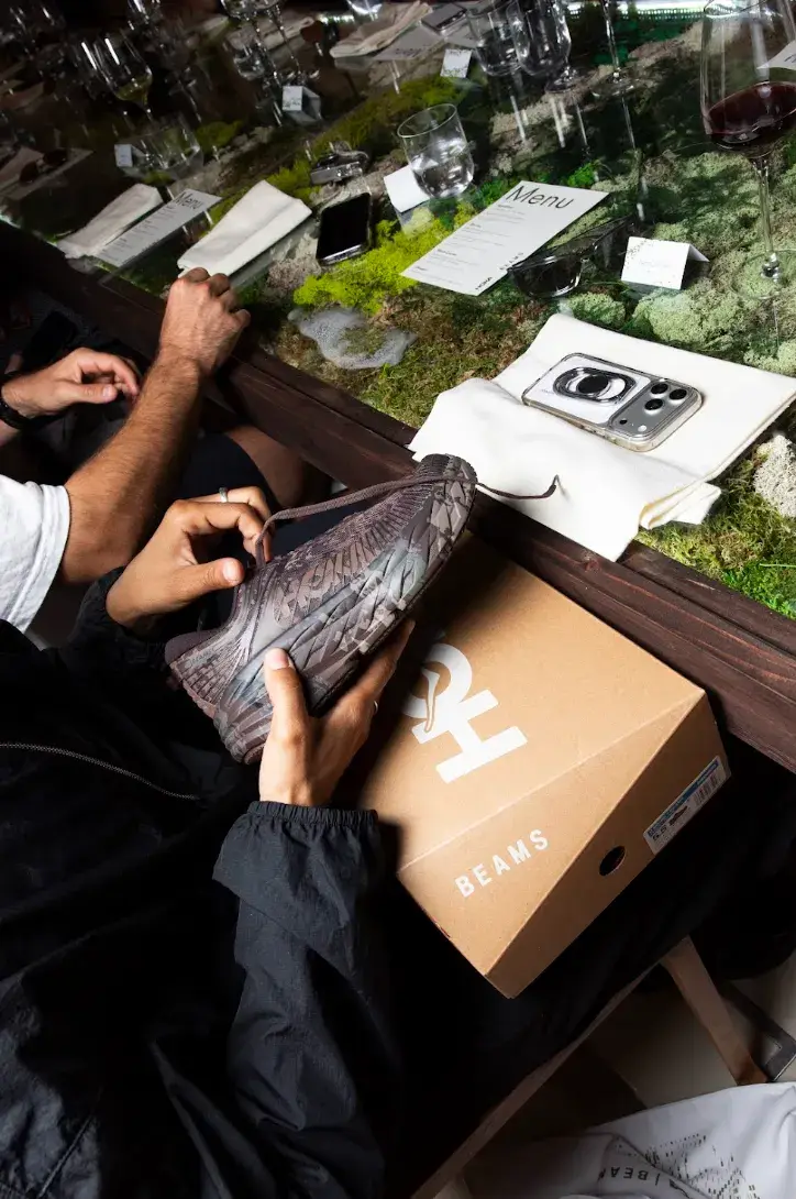 INSIDE THE HOKA × BEAMS COLLABORATION image about the interview discussing footwear design. The discussion covers shoe aesthetics, Japanese street fashion influences, and consumer movement for Hoka and Beams (image 2 of 7)