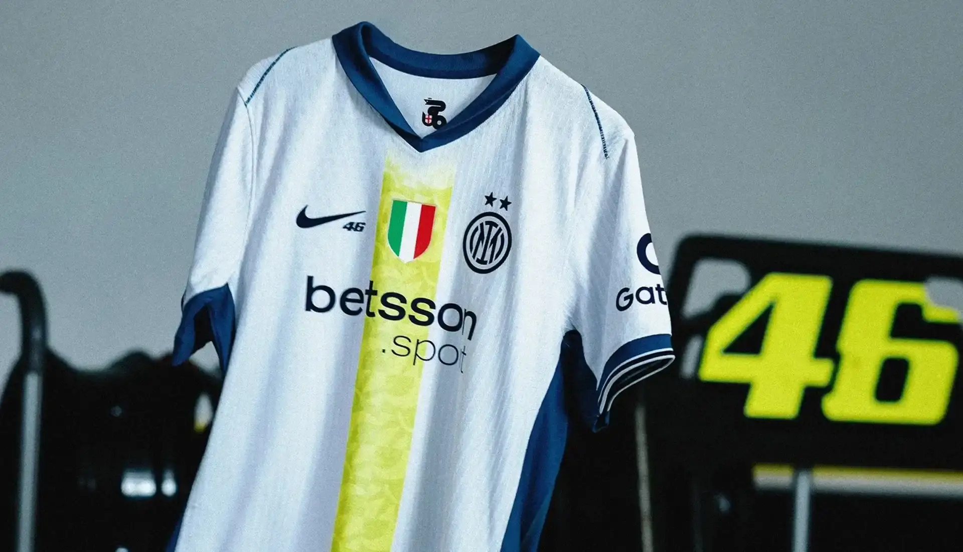 VALENTINO ROSSI INSPIRES INTER'S SPECIAL NIKE AWAY SHIRT photo of special edition Inter Milan away kit created in collaboration with MotoGP champion Valentino Rossi and Nike. The jersey incorporates Rossi's famous Sun and Moon symbols and his racing number 46. The kit will debut during Inter's match against Cagliari on April 12, 2025. The article includes quotes from Rossi expressing his excitement about the collaboration between his two passions: motorcycle racing and football. Information on how to purchase the limited edition shirt is provided at the end. (image 2 of 9)