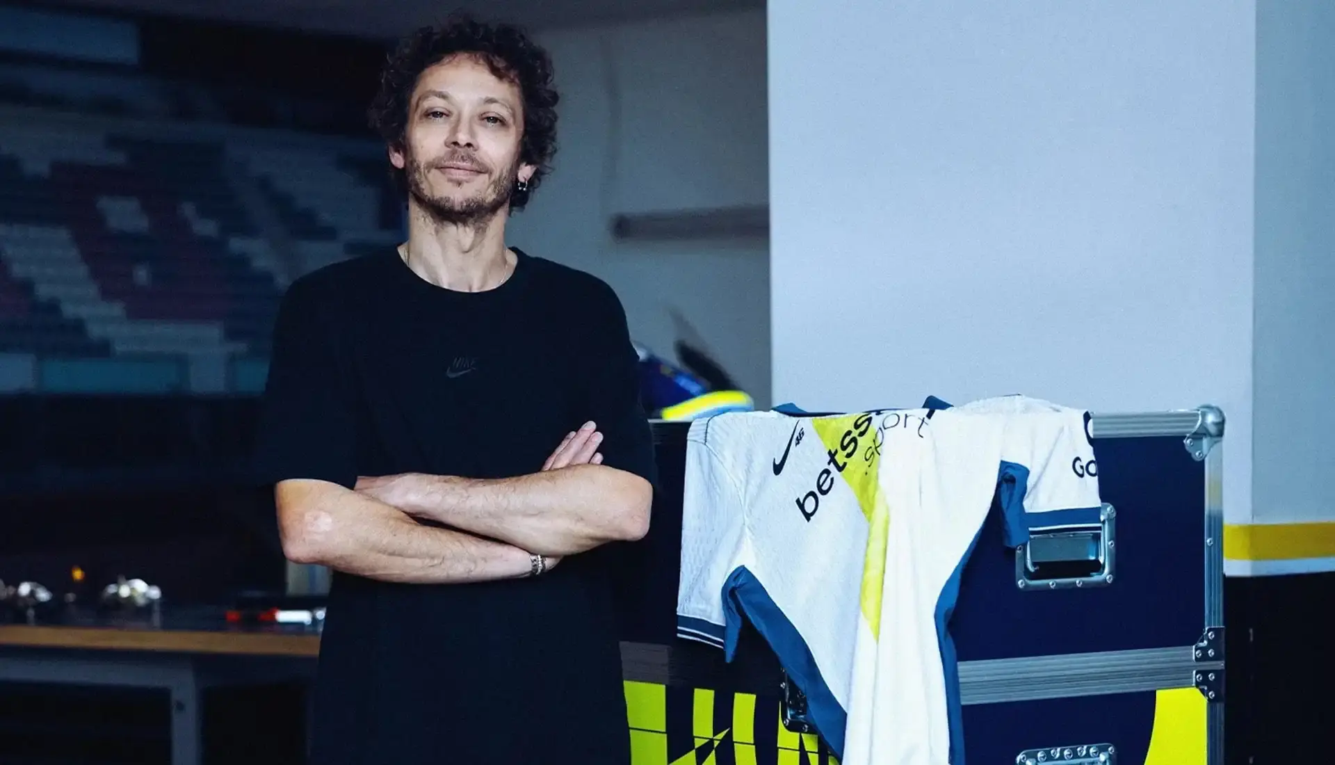 VALENTINO ROSSI INSPIRES INTER'S SPECIAL NIKE AWAY SHIRT photo of special edition Inter Milan away kit created in collaboration with MotoGP champion Valentino Rossi and Nike. The jersey incorporates Rossi's famous Sun and Moon symbols and his racing number 46. The kit will debut during Inter's match against Cagliari on April 12, 2025. The article includes quotes from Rossi expressing his excitement about the collaboration between his two passions: motorcycle racing and football. Information on how to purchase the limited edition shirt is provided at the end. (image 3 of 9)