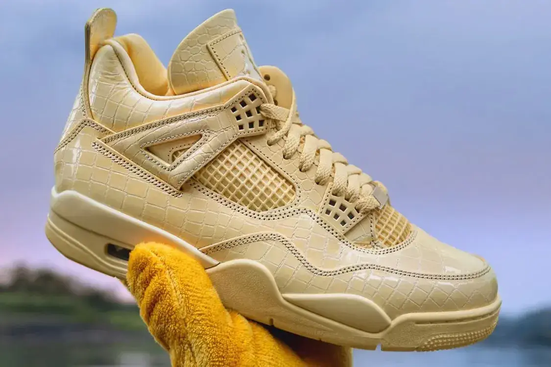 image outlining release details, design elements, and pricing for the J Balvin x Air Jordan 4 Amazonas sneaker.