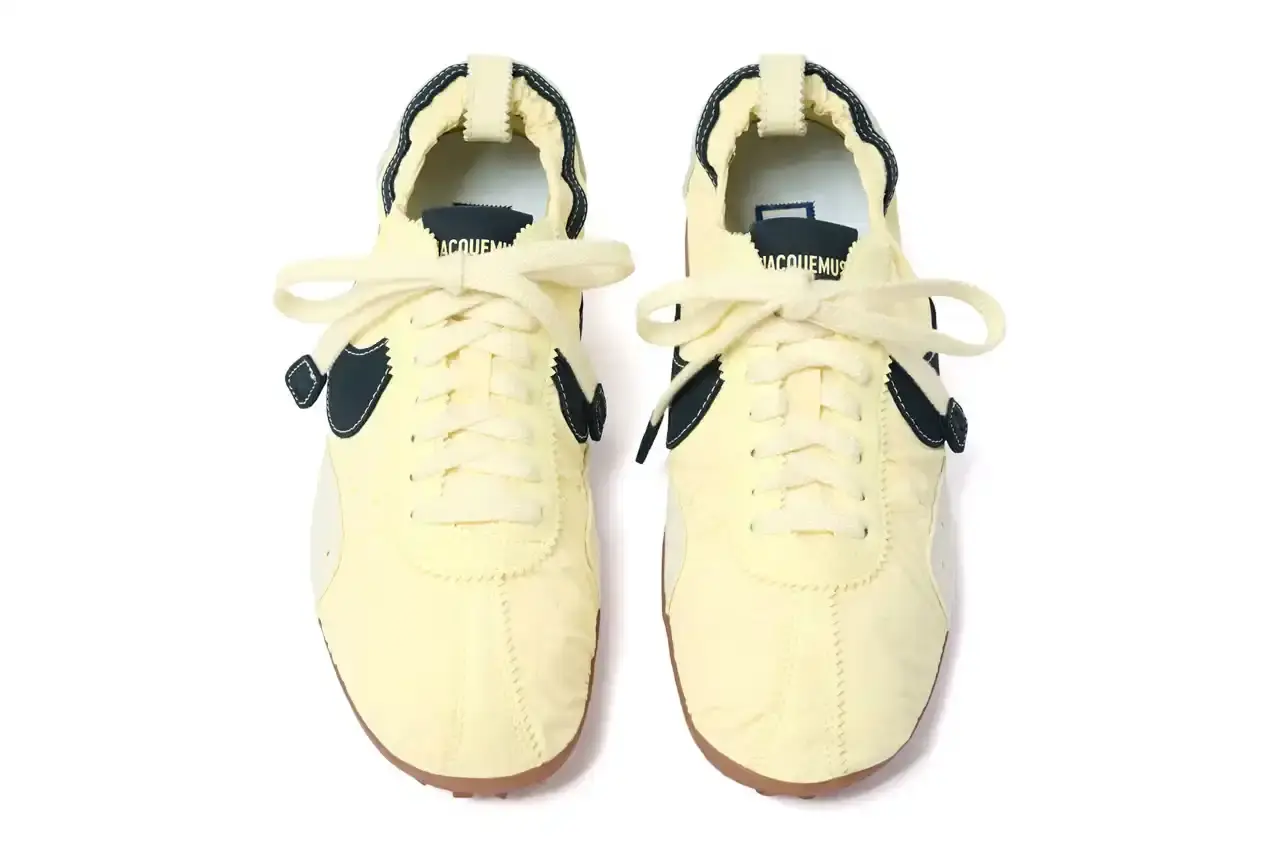 JACQUEMUS NIKE MOON SHOE RETURNS SEPTEMBER 2025 French fashion brand Jacquemus partners with Nike to relaunch the classic Moon Shoe sneaker from 1972 in three new colorways. (image 9 of 13)