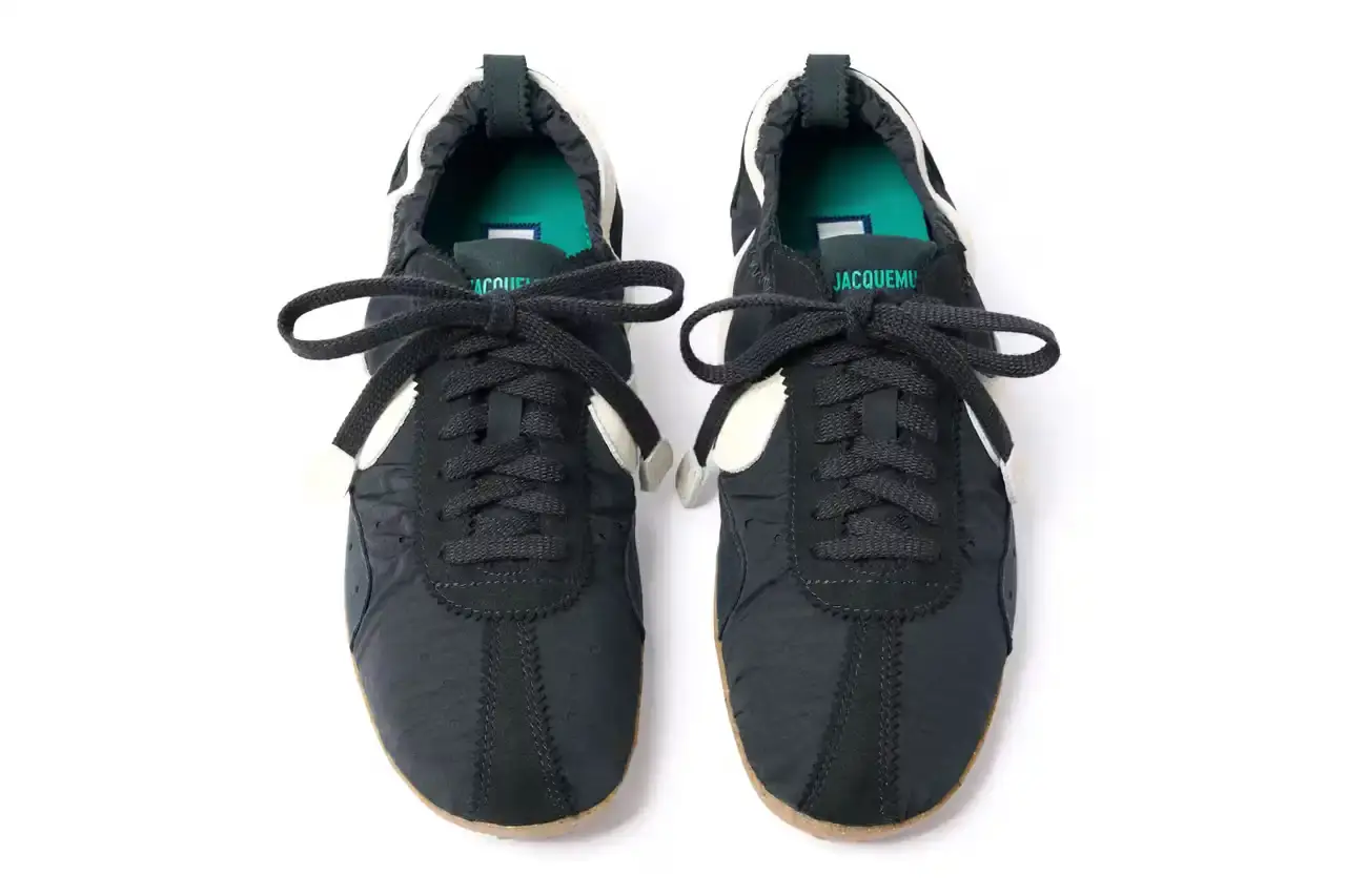 JACQUEMUS NIKE MOON SHOE RETURNS SEPTEMBER 2025 French fashion brand Jacquemus partners with Nike to relaunch the classic Moon Shoe sneaker from 1972 in three new colorways. (image 12 of 13)