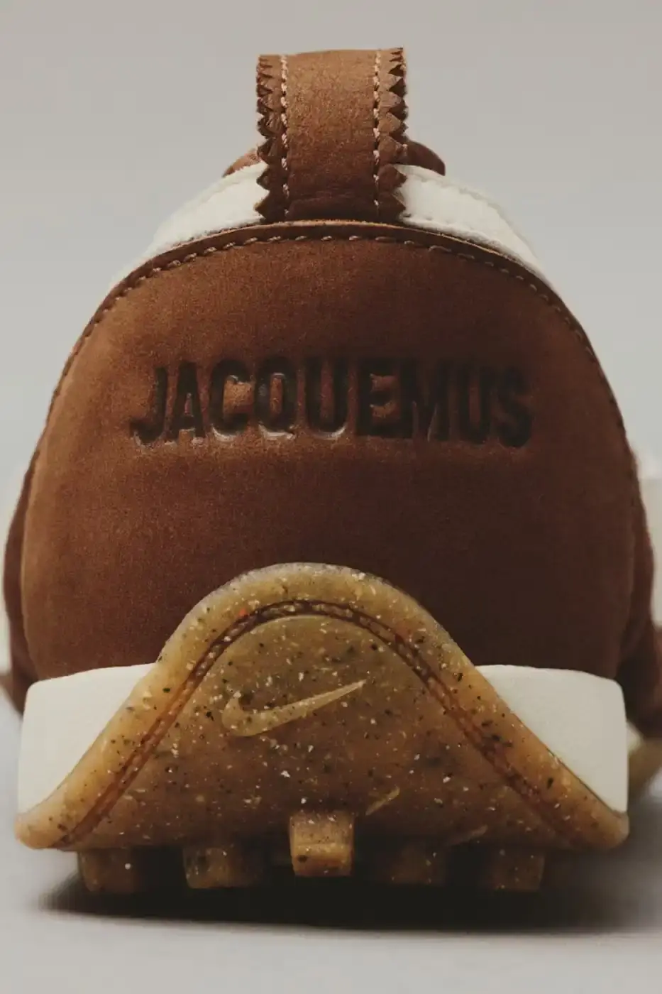 JACQUEMUS AND NIKE DROP NEW MOON SHOES FOR 2026 A text article detailing the Spring 2026 release of three new Jacquemus and Nike Moon Shoe colorways including pricing and design specifications. (image 2 of 8)