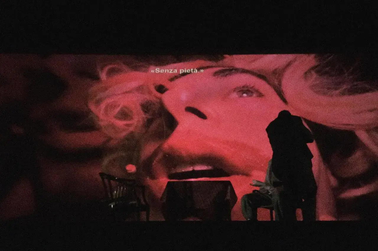 JAMES FRANCO’S DESERT FILMS AT TEATRO MENOTTI, MILAN image of James Franco’s Desert Films at Teatro Menotti in Milan. The text covers the cast, the Lost Highway premise, the live camera and screen, and the audience. photo by Aurelien Caoudal Blikerman (image 2 of 8)