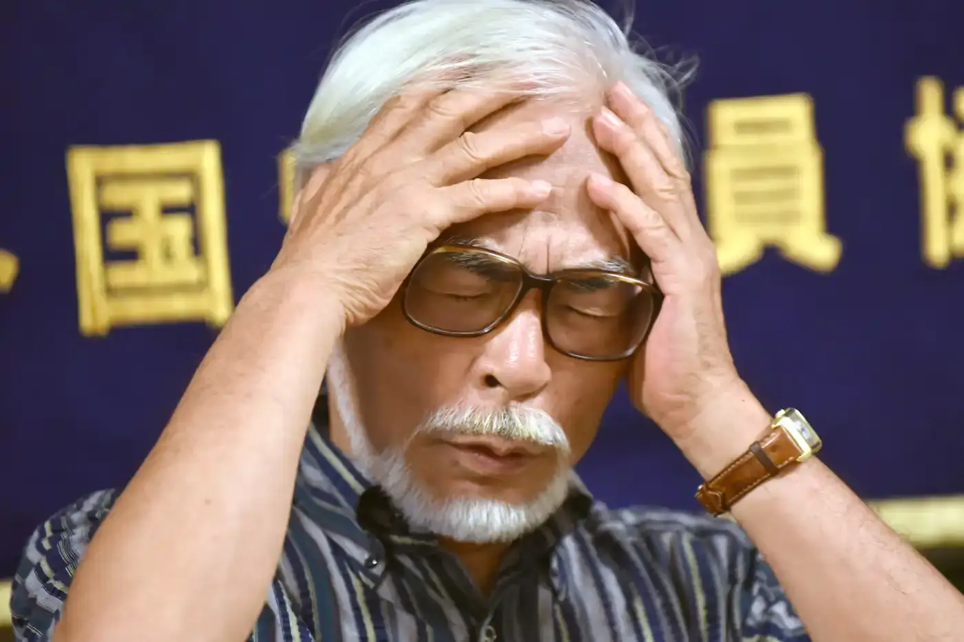 image of discussions in Japan's House of Representatives about the legality of AI-generated images that mimic Studio Ghibli's animation style. It includes quotes from lawmakers debating whether these images violate copyright law, with officials noting that while mimicking a style alone may be legal, creating content recognizable as "Ghibli itself" could constitute infringement. The article details how this issue connects to broader questions about intellectual property in the AI era, especially regarding culturally significant artistic works.