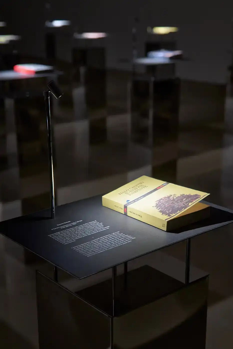 JIL SANDER AND APARTAMENTO OPEN MILAN REFERENCE LIBRARY image detailing the Reference Library by Jil Sander exhibition in Milan. The article lists location details, dates, and the physical setup of the book installation. (image 7 of 7)