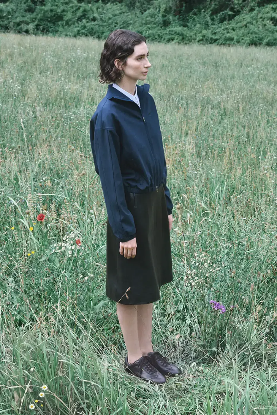 JIL SANDER X PUMA FW26 ADDS APPAREL AND TWO SNEAKERS image about the Jil Sander x PUMA Fall/Winter 2026 collection, covering the wool T7 tracksuit, the Speedcat and Suede sneakers, the campaign and the October 23 launch. A short summary list opens the text. (image 2 of 12)