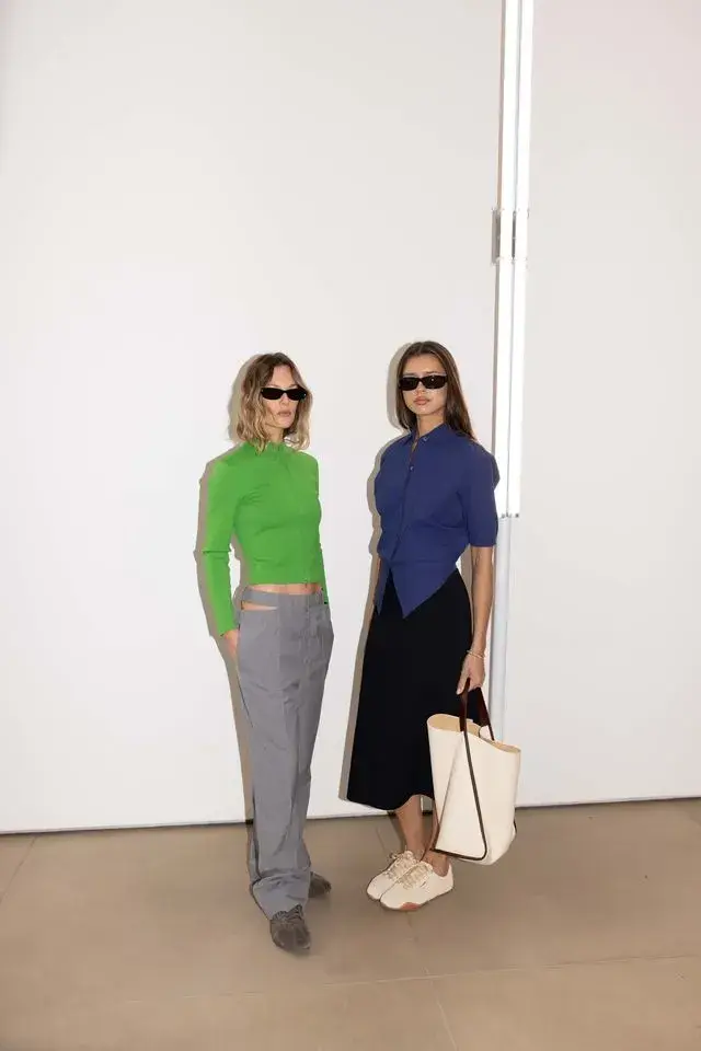 JIL SANDER AND PUMA PRESENT NEW H STREET SNEAKERS Studio image of Jil Sander and Puma low profile leather sneaker in ivory and dark brown with a thin rubber sole and minimal branding. (image 3 of 6)