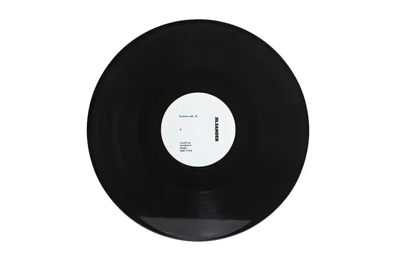 JIL SANDER RELEASES VINYL EP BEFORE MILAN SHOW image about fashion brand Jil Sander releasing a vinyl music EP in collaboration with electronic artist Bochum Welt, preceding their new creative director's first fashion show in Milan.