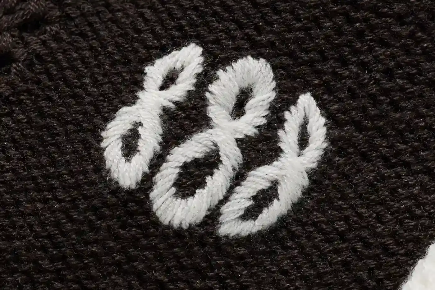 MONTRÉAL'S JJJJOUND TEAMS UP WITH RICE NINE TEN ON KNIT SOCCER JERSEY image of the collaboration between JJJJound and RICE NINE TEN featuring a limited-edition knitted soccer jersey. The piece details the jersey's design elements including textured tuck pattern, contrasting trim, hand-embroidered emblems, and color scheme. Information includes the release date of May 22 at 12 p.m. EST exclusively through JJJJound's website. This is noted as the first partnership between the Montréal design studio and the Japanese brand led by designer Shohei Kimura. (image 3 of 5)