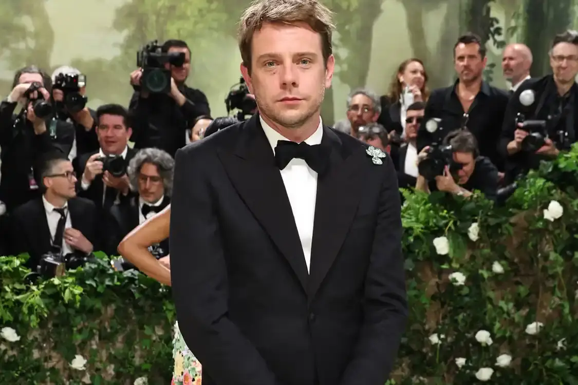 image of Jonathan Anderson's appointment as the new creative director for Dior Men, replacing Kim Jones who resigned in January after seven years. The news was announced by LVMH chairman Bernard Arnault during the company's annual shareholders meeting, confirming industry rumors that had circulated since Anderson left his position at Loewe. The article notes that Arnault did not clarify whether Anderson would also oversee Dior's womenswear collections, currently led by Maria Grazia Chiuri. Anderson's first menswear collection for Dior is expected in June 2025. The article also mentions other LVMH designers recognized by Arnault during the meeting.