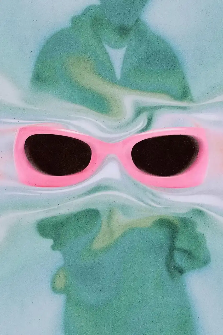 BIEBER DEBUTS SKYLRK COLLECTION image about Justin Bieber's new fashion brand SKYLRK, describing the first collection's products including hoodies in bright colors, oversized sunglasses with bubble lenses, and two footwear styles. The text explains how this new venture differs from his previous Drew House brand and details the collection's design approach and availability. (image 9 of 9)