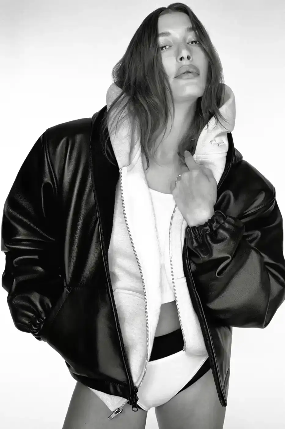 JUSTIN BIEBER SKYLRK LABEL DROPS HAILEY BIEBER CAPSULE image on the release of Justin Bieber's fashion brand SKYLRK's new collection, describing the clothing items, the campaign featuring Hailey Bieber, and the release details.