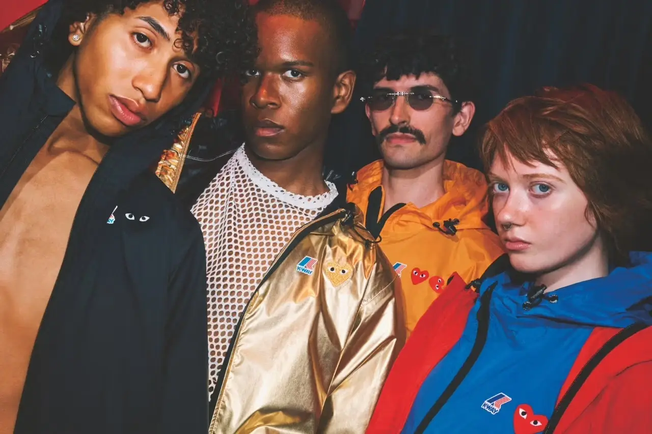 K-Way partners with Play Comme des Garçons for a new collection featuring technical outerwear in gold and black, photographed by Keizo Kitajima.