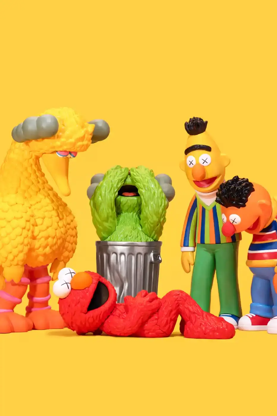 KAWS AND ALLRIGHTSRESERVED LAUNCH SESAME STREET FIGURES image about new KAWS and AllRightsReserved collaboration featuring Sesame Street character vinyl figures with distinctive X-eyes aesthetic, available for pre-order October 16.