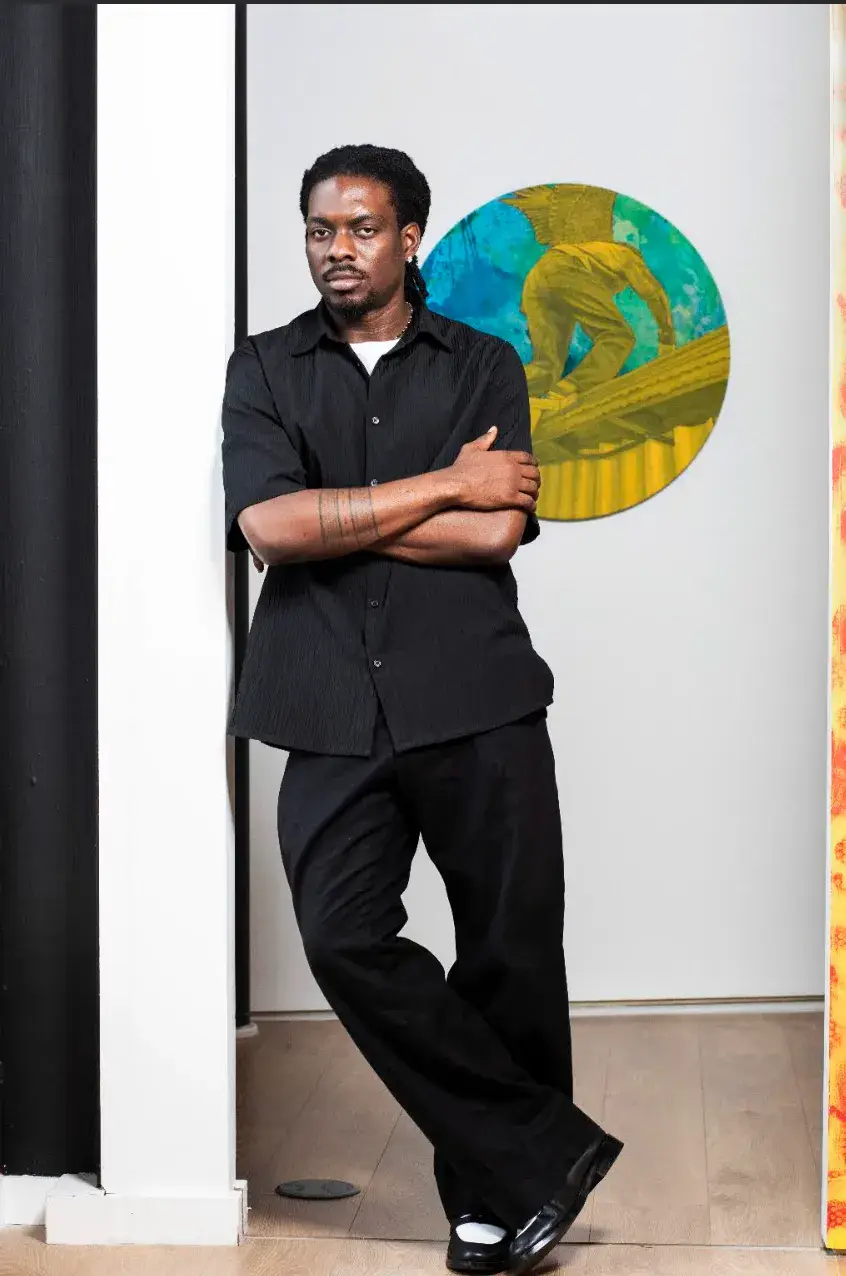 KEN NWADIOGBU SOLO PRESENTATION AT FRIEZE LONDON 2026 image of painter Ken Nwadiogbu's solo presentation at Frieze London 2026, covering the Degussa Young Generation Art Award, the new paintings, the Akwete fabric installation and the fair dates. The lead photo shows the artist with crossed arms in front of a round painting of a yellow figure on a blue and green background. (image 1 of 2)