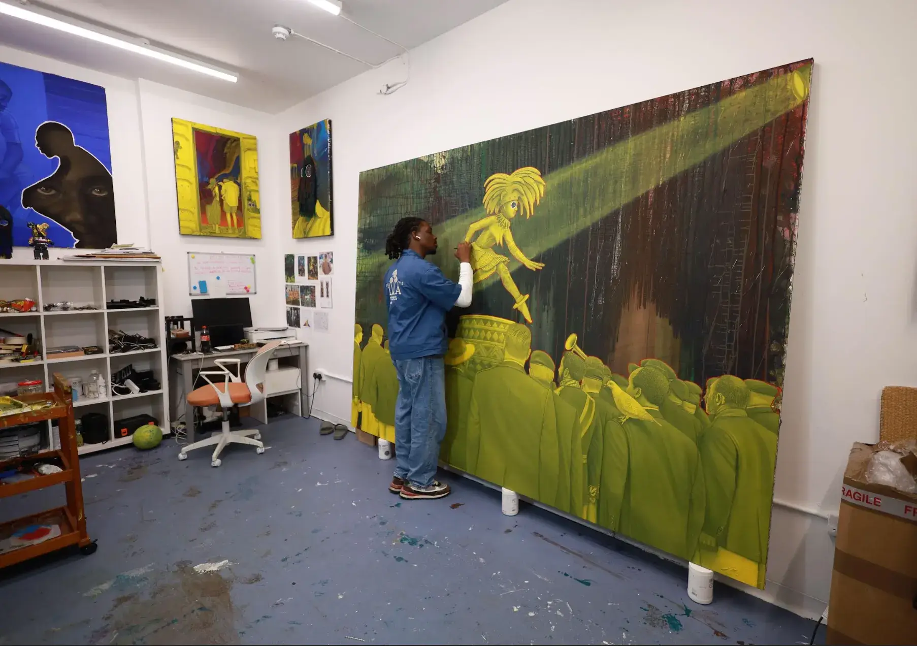 image of painter Ken Nwadiogbu's solo presentation at Frieze London 2026, covering the Degussa Young Generation Art Award, the new paintings, the Akwete fabric installation and the fair dates. The lead photo shows the artist with crossed arms in front of a round painting of a yellow figure on a blue and green background.