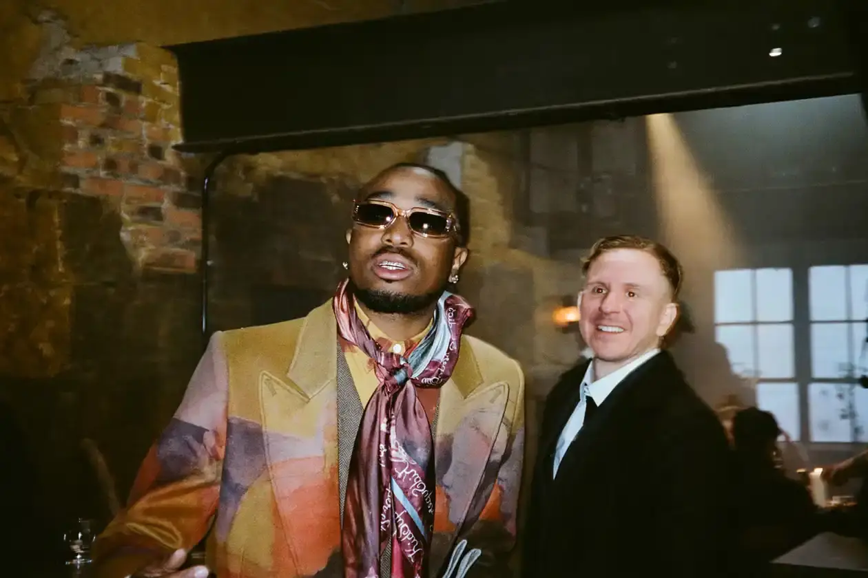 KIDSUPER DEBUTS RECORD LABEL WITH QUAVO AND GIGGS COLLABORATION Colm Dillane, Quavo, and Giggs wearing KidSuper STRING THEORY collection pieces during music video shoot (image 6 of 6)