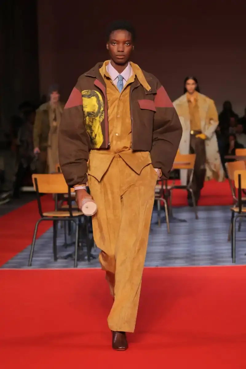 KIDSUPER SHIFTS TONE FOR FALL/WINTER 2026 KidSuper Fall/Winter 2026 collection article discussing the brand's new direction with stylist Imruh Asha, featuring a short film with Vincent Cassel and collaborations with Jameson and Havaianas at paris fashion week (image 4 of 28)