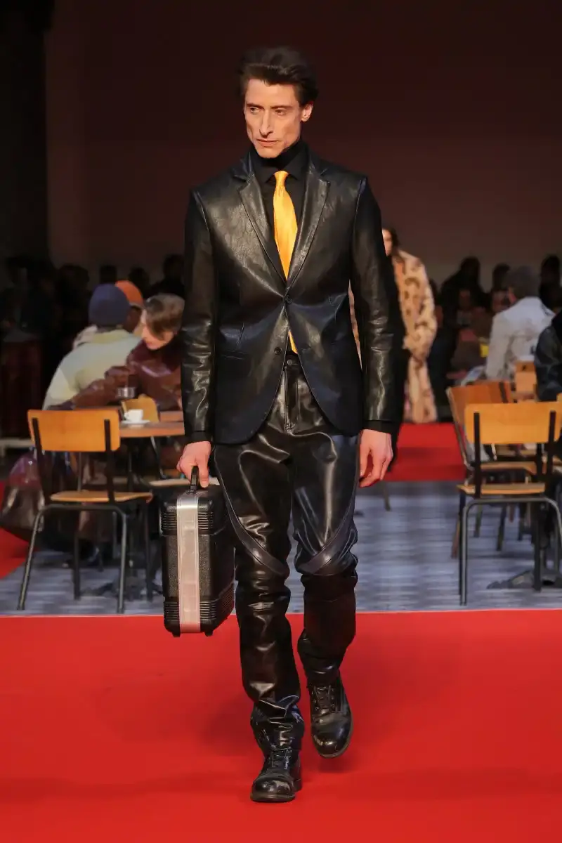 KIDSUPER SHIFTS TONE FOR FALL/WINTER 2026 KidSuper Fall/Winter 2026 collection article discussing the brand's new direction with stylist Imruh Asha, featuring a short film with Vincent Cassel and collaborations with Jameson and Havaianas at paris fashion week (image 10 of 28)