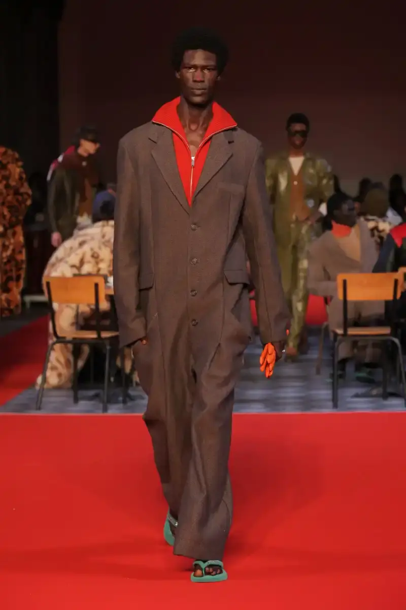 KIDSUPER SHIFTS TONE FOR FALL/WINTER 2026 KidSuper Fall/Winter 2026 collection article discussing the brand's new direction with stylist Imruh Asha, featuring a short film with Vincent Cassel and collaborations with Jameson and Havaianas at paris fashion week (image 17 of 28)