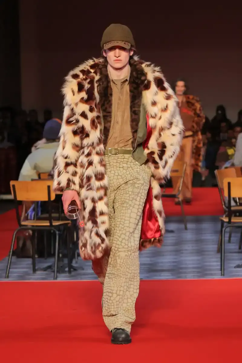 KIDSUPER SHIFTS TONE FOR FALL/WINTER 2026 KidSuper Fall/Winter 2026 collection article discussing the brand's new direction with stylist Imruh Asha, featuring a short film with Vincent Cassel and collaborations with Jameson and Havaianas at paris fashion week (image 12 of 28)