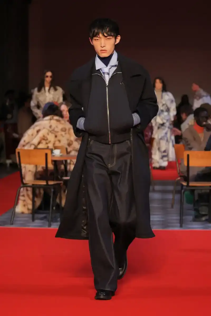 KIDSUPER SHIFTS TONE FOR FALL/WINTER 2026 KidSuper Fall/Winter 2026 collection article discussing the brand's new direction with stylist Imruh Asha, featuring a short film with Vincent Cassel and collaborations with Jameson and Havaianas at paris fashion week (image 23 of 28)