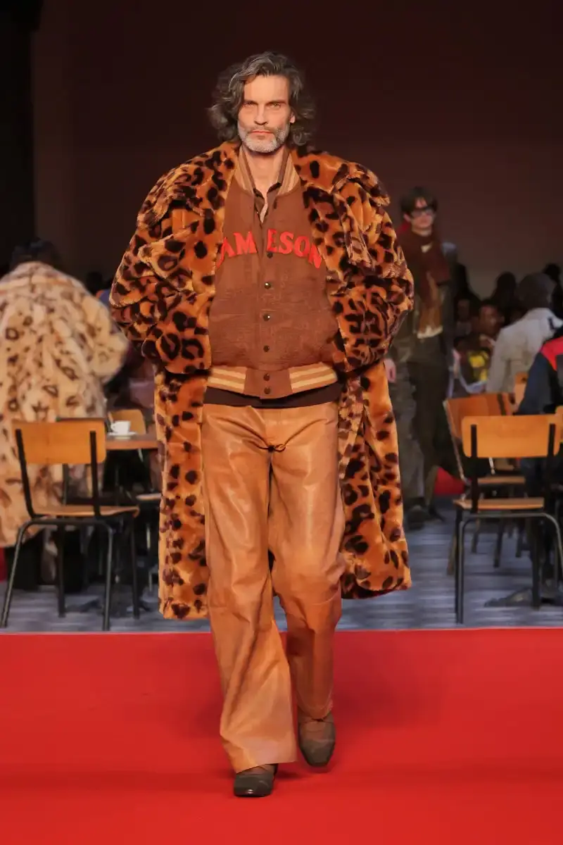 KIDSUPER SHIFTS TONE FOR FALL/WINTER 2026 KidSuper Fall/Winter 2026 collection article discussing the brand's new direction with stylist Imruh Asha, featuring a short film with Vincent Cassel and collaborations with Jameson and Havaianas at paris fashion week (image 13 of 28)