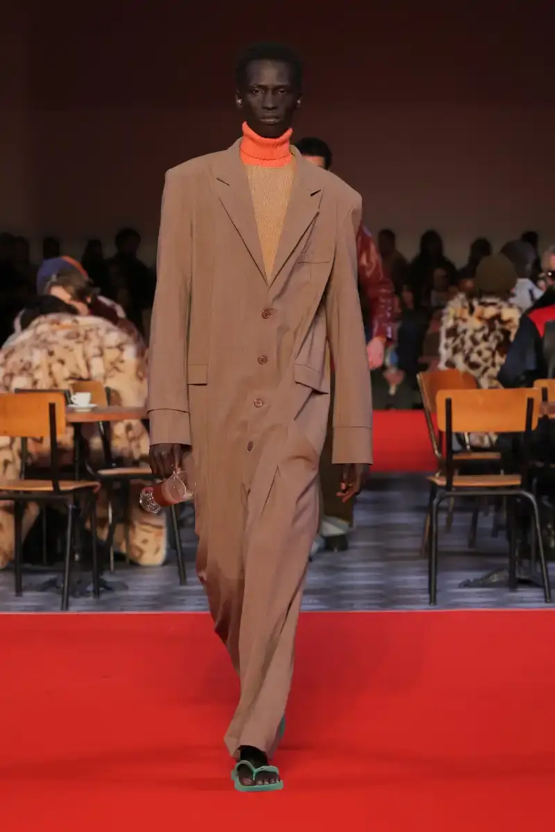 KIDSUPER SHIFTS TONE FOR FALL/WINTER 2026 KidSuper Fall/Winter 2026 collection article discussing the brand's new direction with stylist Imruh Asha, featuring a short film with Vincent Cassel and collaborations with Jameson and Havaianas at paris fashion week (image 15 of 28)