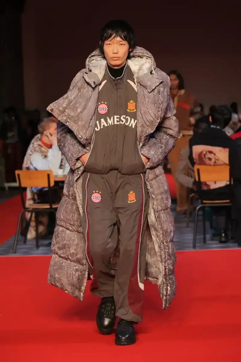 KIDSUPER SHIFTS TONE FOR FALL/WINTER 2026 KidSuper Fall/Winter 2026 collection article discussing the brand's new direction with stylist Imruh Asha, featuring a short film with Vincent Cassel and collaborations with Jameson and Havaianas at paris fashion week (image 25 of 28)