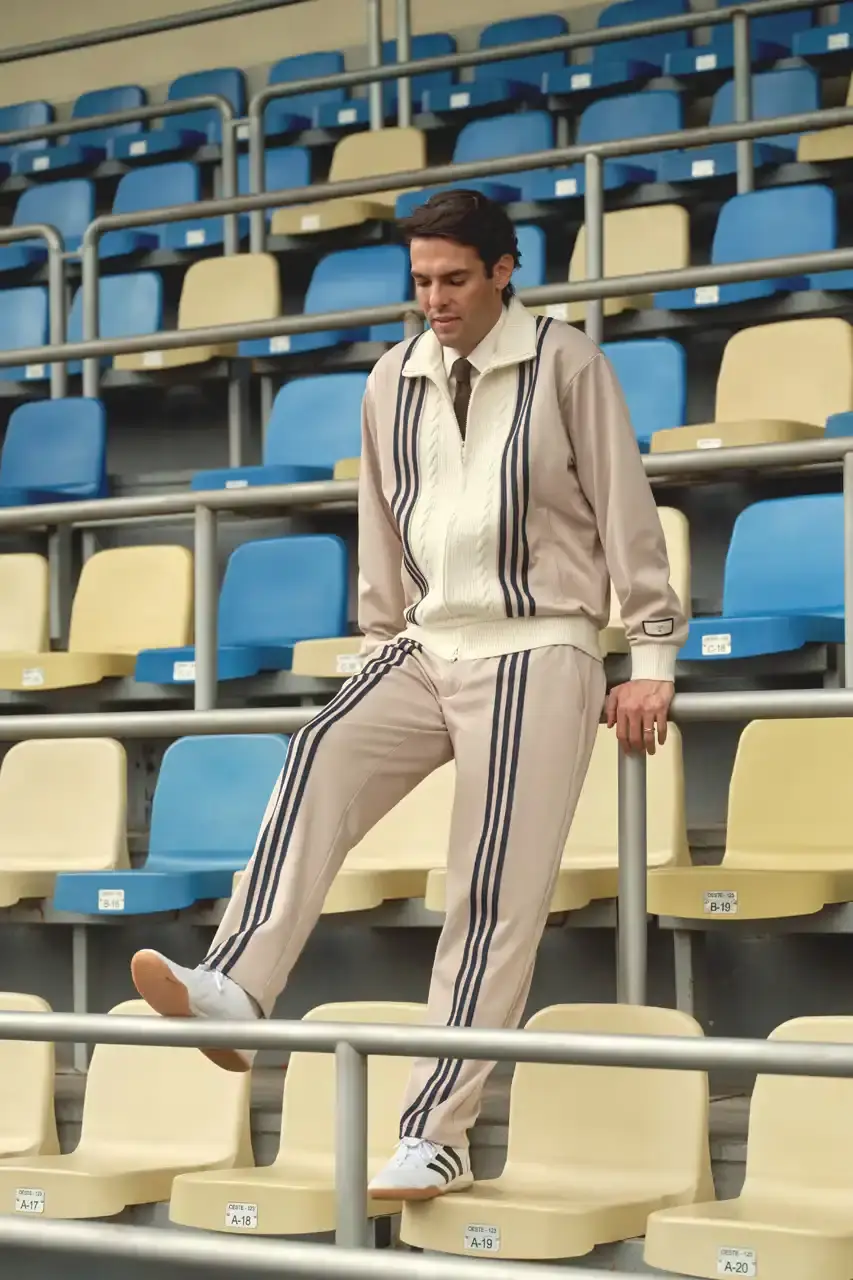 KITH AND ADIDAS FOOTBALL REUNITE AFTER SEVEN-YEAR HIATUS This article announces the Spring 2025 collaboration between Kith and adidas Football after a seven-year hiatus. The collection includes premium apparel (stadium coats, tracksuits, jerseys), footwear (custom Predator models and lifestyle options), and accessories (scarves, bags, headwear). Special collaborations with ESPN, Chase, and DHL Express are highlighted. The full collection launches April 18 online and in Kith retail locations. The article is structured in six paragraphs that outline the collaboration's scope, key apparel pieces, special partnerships, footwear offerings, accessories, and release details. (image 11 of 20)