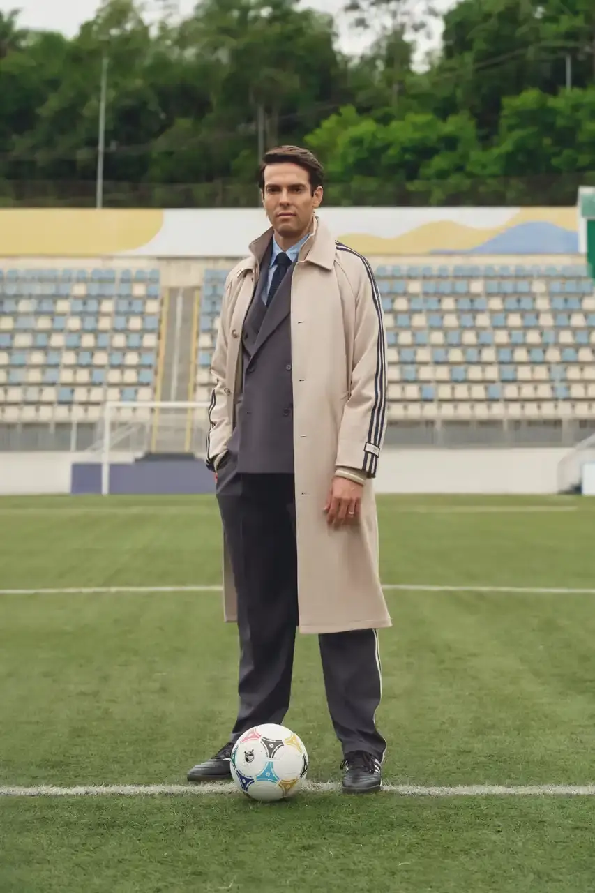 KITH AND ADIDAS FOOTBALL REUNITE AFTER SEVEN-YEAR HIATUS This article announces the Spring 2025 collaboration between Kith and adidas Football after a seven-year hiatus. The collection includes premium apparel (stadium coats, tracksuits, jerseys), footwear (custom Predator models and lifestyle options), and accessories (scarves, bags, headwear). Special collaborations with ESPN, Chase, and DHL Express are highlighted. The full collection launches April 18 online and in Kith retail locations. The article is structured in six paragraphs that outline the collaboration's scope, key apparel pieces, special partnerships, footwear offerings, accessories, and release details. (image 17 of 20)