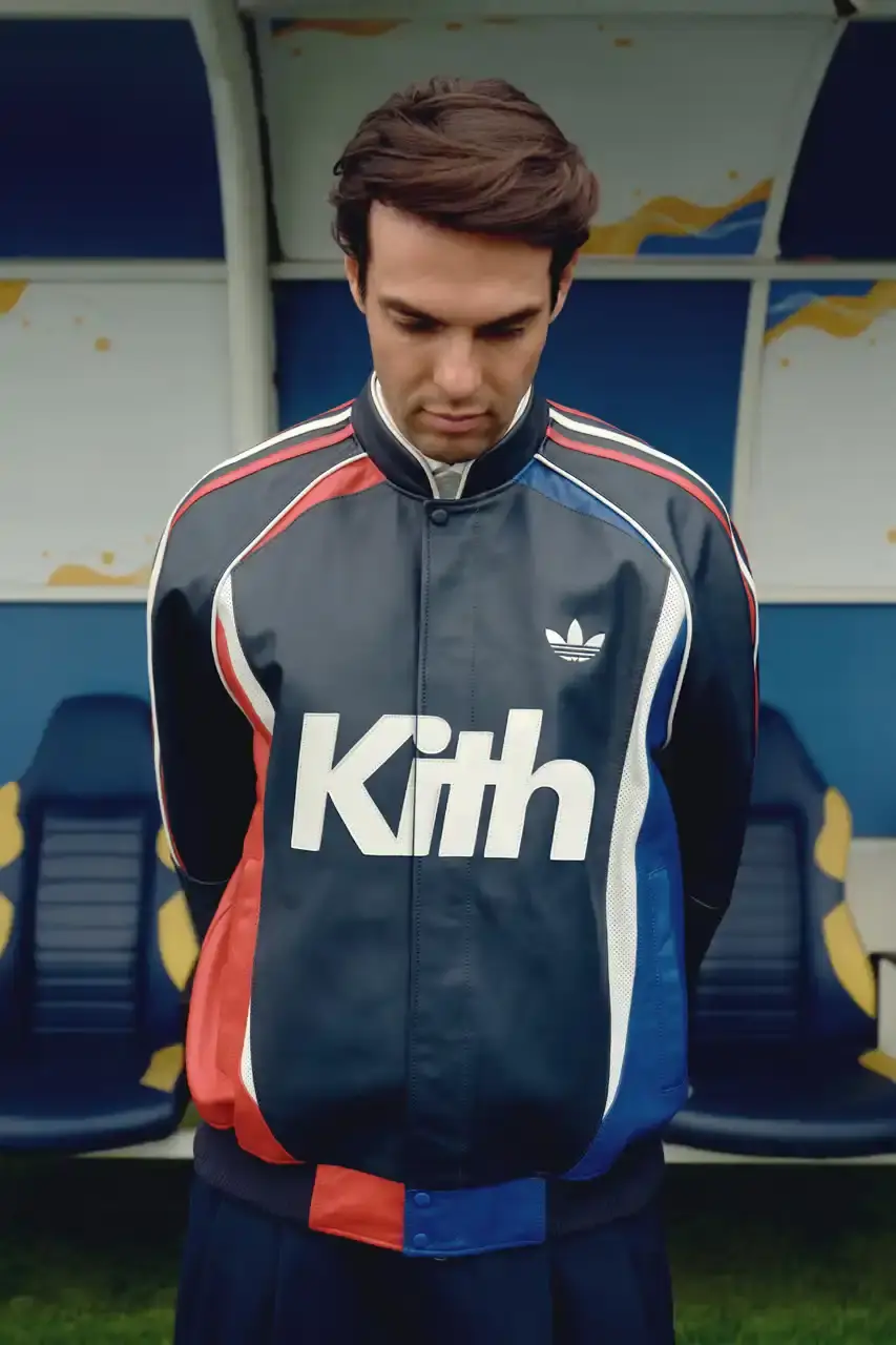 KITH AND ADIDAS FOOTBALL REUNITE AFTER SEVEN-YEAR HIATUS This article announces the Spring 2025 collaboration between Kith and adidas Football after a seven-year hiatus. The collection includes premium apparel (stadium coats, tracksuits, jerseys), footwear (custom Predator models and lifestyle options), and accessories (scarves, bags, headwear). Special collaborations with ESPN, Chase, and DHL Express are highlighted. The full collection launches April 18 online and in Kith retail locations. The article is structured in six paragraphs that outline the collaboration's scope, key apparel pieces, special partnerships, footwear offerings, accessories, and release details. (image 4 of 20)