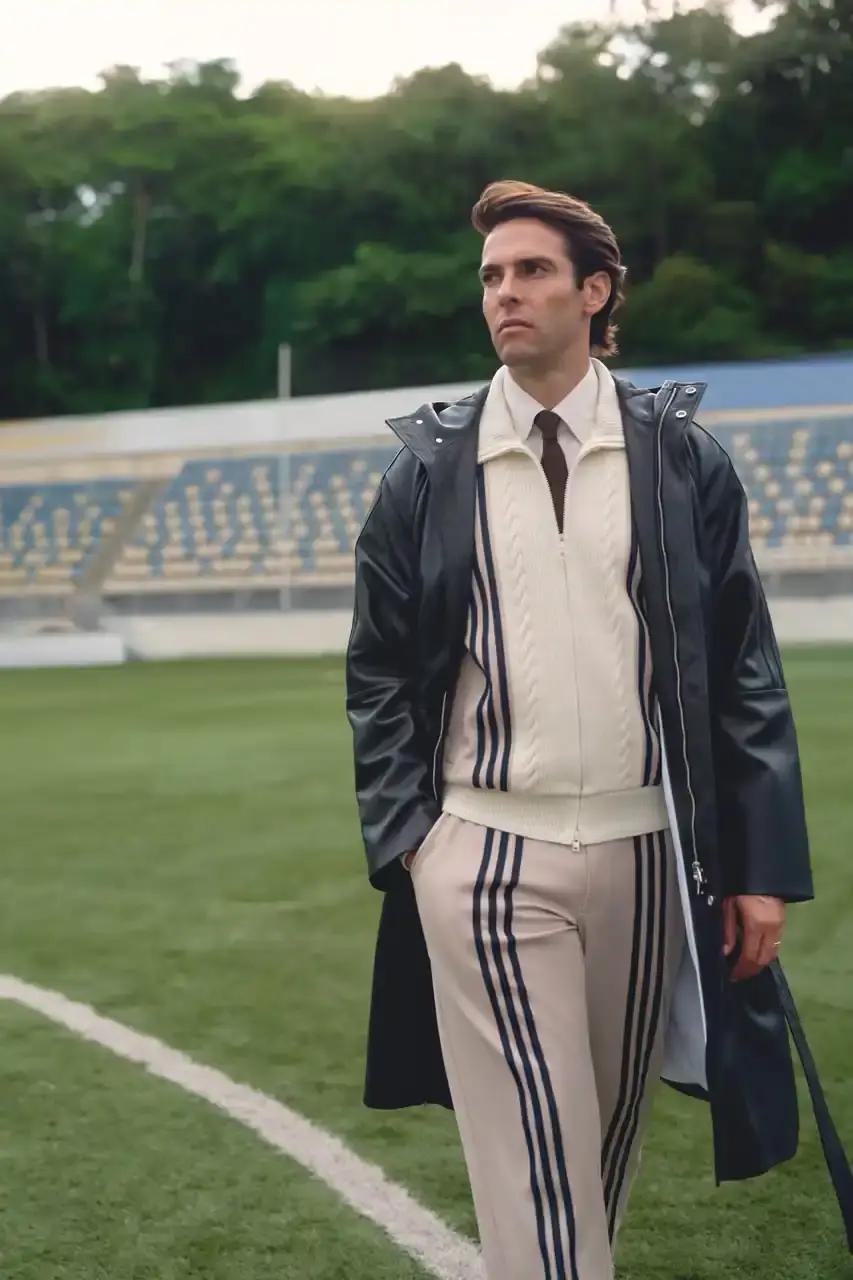 KITH AND ADIDAS FOOTBALL REUNITE AFTER SEVEN-YEAR HIATUS This article announces the Spring 2025 collaboration between Kith and adidas Football after a seven-year hiatus. The collection includes premium apparel (stadium coats, tracksuits, jerseys), footwear (custom Predator models and lifestyle options), and accessories (scarves, bags, headwear). Special collaborations with ESPN, Chase, and DHL Express are highlighted. The full collection launches April 18 online and in Kith retail locations. The article is structured in six paragraphs that outline the collaboration's scope, key apparel pieces, special partnerships, footwear offerings, accessories, and release details. (image 10 of 20)